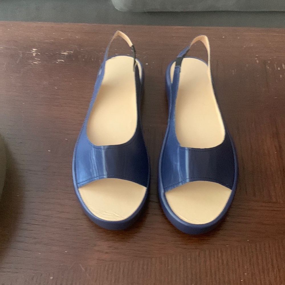 Navy blue sandals with heel strap!  Brand new!